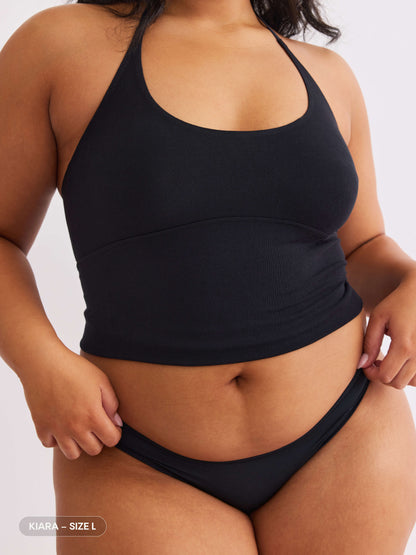 model B wearing vesper black pair of sustainable non-toxic women's underwear  front view 